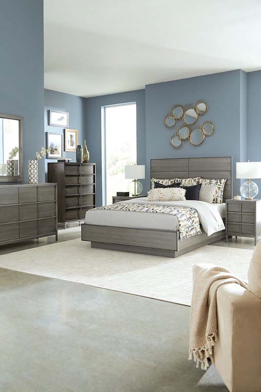 Coastal blues and greys create an inviting space for a primary bedroom